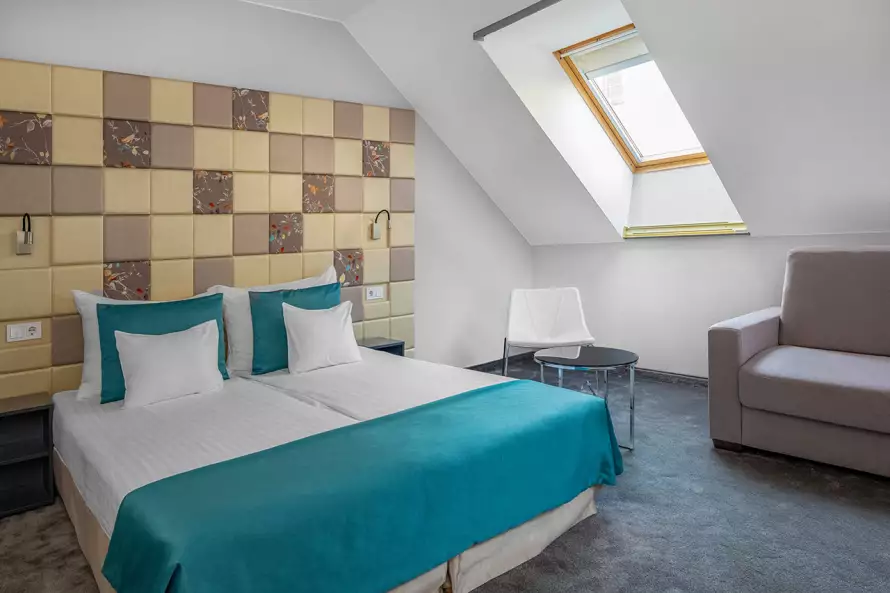 Szobák & lakosztályok Superior manzard room with sofa, Hotel President